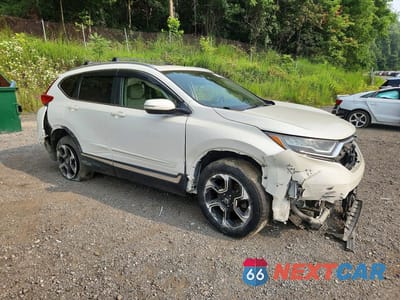 Czwarte zdjęcie samochodu z boku: 2017 HONDA CR-V TOURING VIN:5J6RW2H9XHL006641 - miniatura