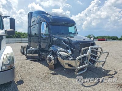Czwarte zdjęcie samochodu z boku: 2020 VOLVO VNL (4) - SEMI TRUCK VIN:4V4NC9TJ1LN253779 - miniatura