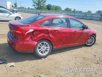 Trzecie zdjęcie samochodu z tyłu: 2016 FORD FOCUS SE VIN:1FADP3F25GL305466 - miniatura