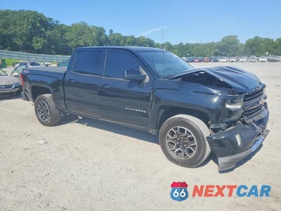 Czwarte zdjęcie samochodu z boku: 2017 CHEVROLET SILVERADO K1500 LT VIN:3GCUKREC1HG455238 - miniatura