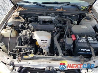 Zdjęcie 11 z 12 samochodu: 2000 TOYOTA CAMRY LE VIN:4T1BG22K1YU958191 - miniatura