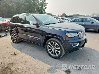 Czwarte zdjęcie samochodu z boku: 2017 JEEP GRAND CHEROKEE OVERLAND VIN:1C4RJFCG7HC693739 - miniatura