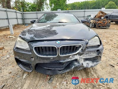 Piąte zdjęcie samochodu w środku: 2015 BMW M6 VIN:WBSLZ9C53FD651227 - miniatura