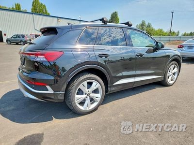 Trzecie zdjęcie samochodu z tyłu: 2023 AUDI Q4 E-TRON PRESTIGE VIN:WA1M2BFZ0PP035727 - miniatura