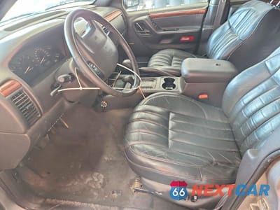 Zdjęcie 7 z 12 samochodu: 1999 JEEP GRAND CHEROKEE LIMITED VIN:1J4GW68N4XC689107 - miniatura