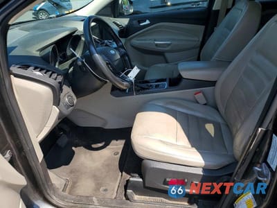 Zdjęcie 7 z 13 samochodu: 2017 FORD ESCAPE TITANIUM VIN:1FMCU9J94HUD90684 - miniatura