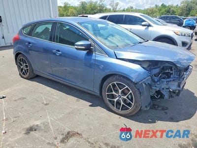 Czwarte zdjęcie samochodu z boku: 2018 FORD FOCUS SEL VIN:1FADP3M26JL266204 - miniatura