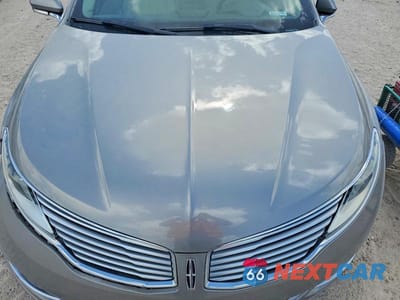 Zdjęcie 11 z 12 samochodu: 2015 LINCOLN MKZ HYBRID VIN:3LN6L2LU6FR624398 - miniatura