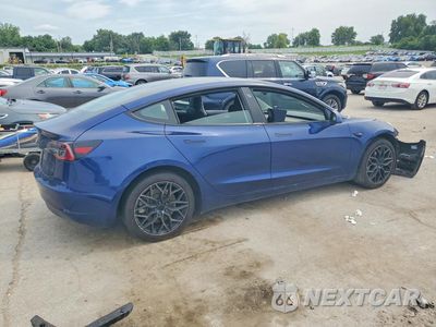 Trzecie zdjęcie samochodu z tyłu: 2023 TESLA MODEL 3 VIN:5YJ3E1EA4PF579866 - miniatura