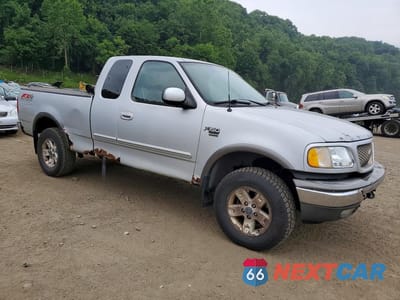 Czwarte zdjęcie samochodu z boku: 2003 FORD F150 VIN:1FTRX18L03NA92385 - miniatura