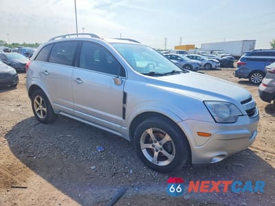 Czwarte zdjęcie samochodu z boku: 2013 CHEVROLET CAPTIVA LT VIN:3GNAL3EKXDS572187 - miniatura