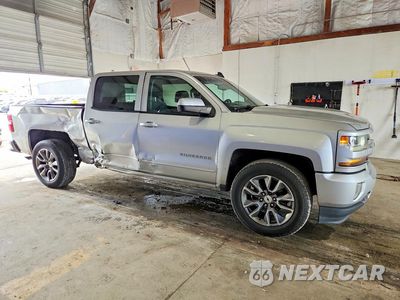Czwarte zdjęcie samochodu z boku: 2017 CHEVROLET SILVERADO K1500 LT VIN:3GCUKREC6HG152715 - miniatura