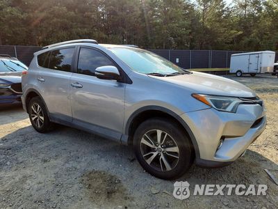 Czwarte zdjęcie samochodu z boku: 2016 TOYOTA RAV4 XLE VIN:2T3WFREVXGW298998 - miniatura