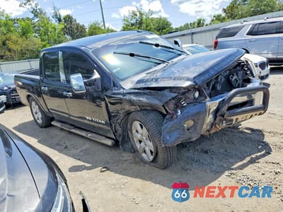 Czwarte zdjęcie samochodu z boku: 2009 NISSAN TITAN XE FFV VIN:1N6BA07D49N317601 - miniatura
