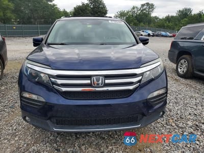 Piąte zdjęcie samochodu w środku: 2017 HONDA PILOT TOURING VIN:5FNYF6H90HB066388 - miniatura
