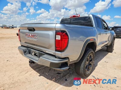 Trzecie zdjęcie samochodu z tyłu: 2024 GMC CANYON ELEVATION VIN:1GTP5BEK8R1269294 - miniatura