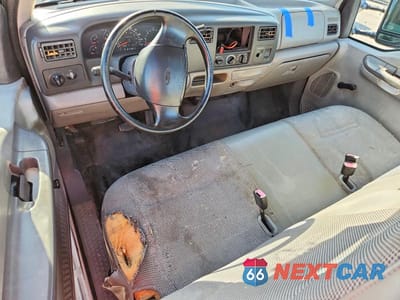 Zdjęcie 8 z 13 samochodu: 1999 FORD F250 SUPER DUTY VIN:1FDNX20L5XEE79452 - miniatura