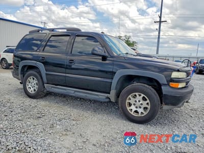 Czwarte zdjęcie samochodu z boku: 2004 CHEVROLET TAHOE K1500 VIN:1GNEK13Z94R289047 - miniatura
