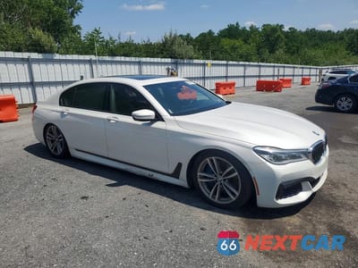 Czwarte zdjęcie samochodu z boku: 2016 BMW 750 XI VIN:WBA7F2C57GG419395 - miniatura