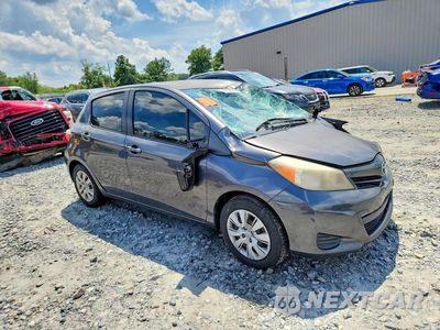 Czwarte zdjęcie samochodu z boku: 2014 TOYOTA YARIS 5-DOOR LE VIN:JTDKTUD38ED576818 - miniatura