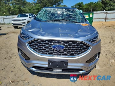 Piąte zdjęcie samochodu w środku: 2022 FORD EDGE TITANIUM VIN:2FMPK4K9XNBA19409 - miniatura