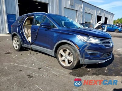Czwarte zdjęcie samochodu z boku: 2017 LINCOLN MKC PREMIERE VIN:5LMCJ1C90HUL49537 - miniatura
