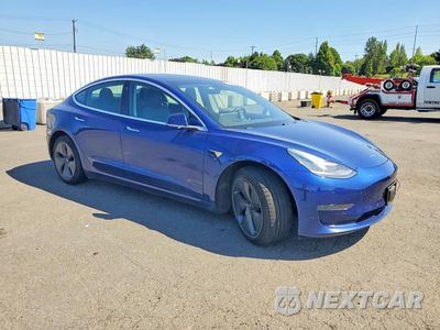 Czwarte zdjęcie samochodu z boku: 2020 TESLA MODEL 3 VIN:5YJ3E1EA1LF764032 - miniatura