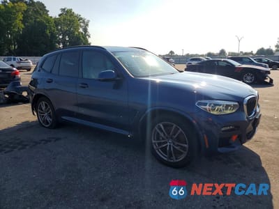 Czwarte zdjęcie samochodu z boku: 2020 BMW X3 XDRIVE30E VIN:5UXTS1C04L9D52878 - miniatura