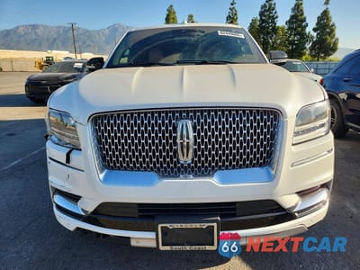 Piąte zdjęcie samochodu w środku: 2020 LINCOLN NAVIGATOR L RESERVE VIN:5LMJJ3LTXLEL23626 - miniatura