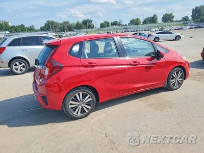 Trzecie zdjęcie samochodu z tyłu: 2016 HONDA FIT EX VIN:JHMGK5H74GX038385 - miniatura