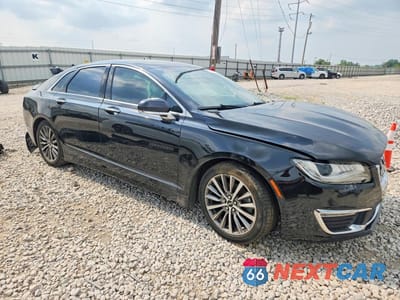Czwarte zdjęcie samochodu z boku: 2017 LINCOLN MKZ SELECT VIN:3LN6L5D99HR665381 - miniatura