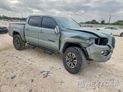 Czwarte zdjęcie samochodu z boku: 2023 TOYOTA TACOMA TRD SPORT VIN:3TYAZ5CN6PT035975 - miniatura