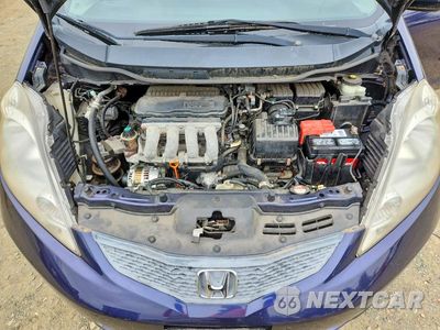 Zdjęcie 11 z 12 samochodu: 2009 HONDA FIT SPORT VIN:JHMGE88689S038759 - miniatura