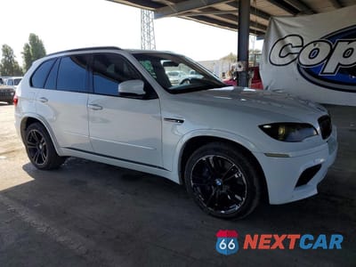 Czwarte zdjęcie samochodu z boku: 2011 BMW X5 M VIN:5YMGY0C51BLK26927 - miniatura