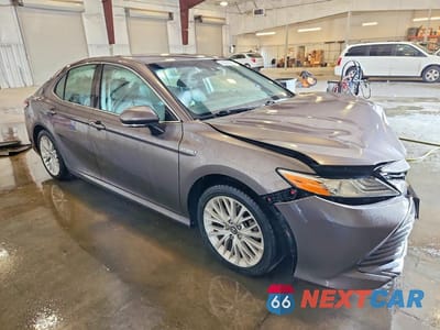 Czwarte zdjęcie samochodu z boku: 2019 TOYOTA CAMRY HYBRID XLE VIN:4T1B21HK1KU513862 - miniatura