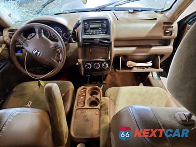 Zdjęcie 8 z 13 samochodu: 2002 HONDA CR-V EX VIN:JHLRD78862C034012 - miniatura