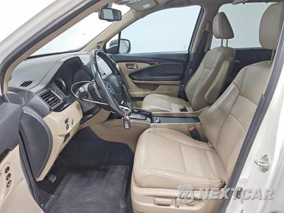 Zdjęcie 7 z 13 samochodu: 2017 HONDA PILOT TOURING VIN:5FNYF5H93HB021312 - miniatura