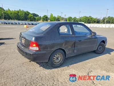 Trzecie zdjęcie samochodu z tyłu: 2000 HYUNDAI ACCENT L VIN:KMHCF35G7YU039171 - miniatura