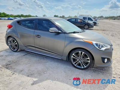 Czwarte zdjęcie samochodu z boku: 2016 HYUNDAI VELOSTER TURBO VIN:KMHTC6AE6GU272438 - miniatura