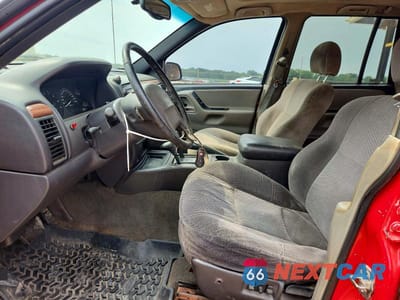 Zdjęcie 7 z 13 samochodu: 1999 JEEP GRAND CHEROKEE LAREDO VIN:1J4GW58S8XC588362 - miniatura