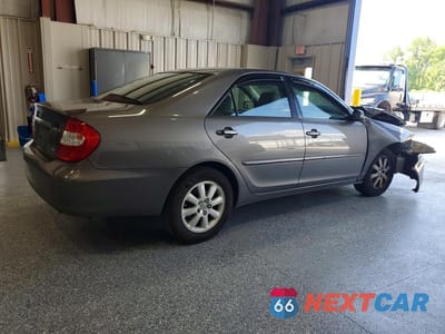 Trzecie zdjęcie samochodu z tyłu: 2003 TOYOTA CAMRY XLE V6 VIN:4T1BF30K83U552834 - miniatura