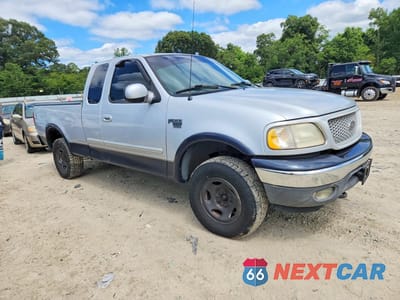 Czwarte zdjęcie samochodu z boku: 1999 FORD F150 VIN:1FTRX18W4XNA79350 - miniatura