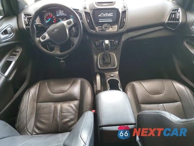 Zdjęcie 8 z 14 samochodu: 2013 FORD ESCAPE TITANIUM VIN:1FMCU9J98DUA02575 - miniatura