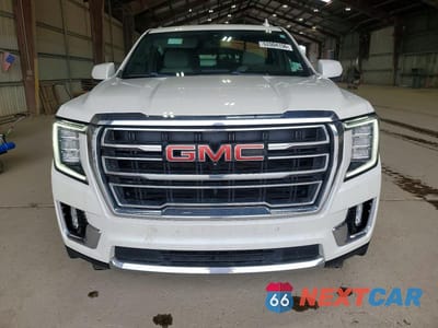Piąte zdjęcie samochodu w środku: 2021 GMC YUKON SLT VIN:1GKS1BKD4MR362016 - miniatura