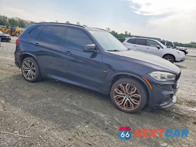 Czwarte zdjęcie samochodu z boku: 2015 BMW X5 XDRIVE50I VIN:5UXKR6C53F0J79134 - miniatura