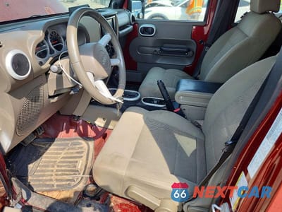 Zdjęcie 7 z 13 samochodu: 2008 JEEP WRANGLER UNLIMITED SAHARA VIN:1J8GA59188L614334 - miniatura