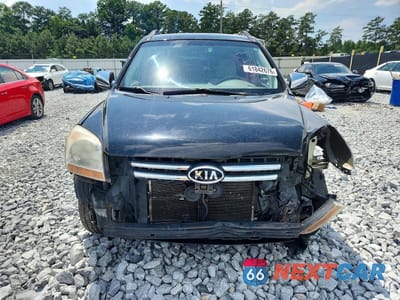 Piąte zdjęcie samochodu w środku: 2007 KIA SPORTAGE LX VIN:KNDJF724277389513 - miniatura