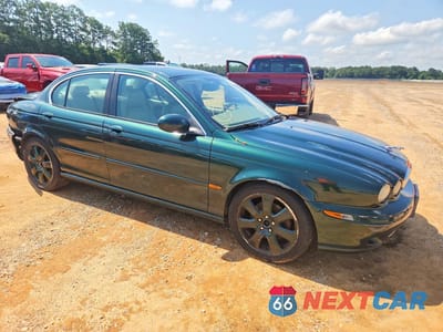 Czwarte zdjęcie samochodu z boku: 2004 JAGUAR X-TYPE 3.0 VIN:SAJEA51C64WD80901 - miniatura