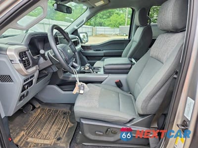 Zdjęcie 7 z 12 samochodu: 2023 FORD F150 LIGHTNING PRO VIN:1FTVW1EV1PWG50400 - miniatura