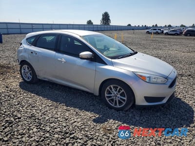 Czwarte zdjęcie samochodu z boku: 2016 FORD FOCUS SE VIN:1FADP3K21GL276294 - miniatura